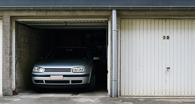 a car inside an open garage